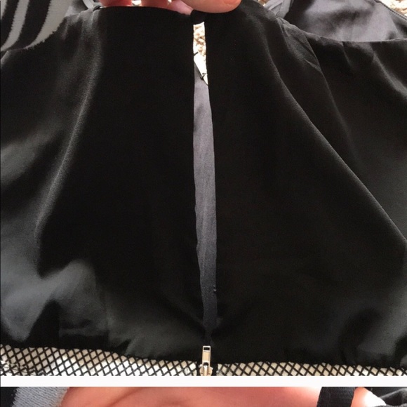 A Lulumari black open back Romper - Picture 7 of 8